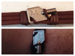 A leather bracelet with a keyboard lock key.